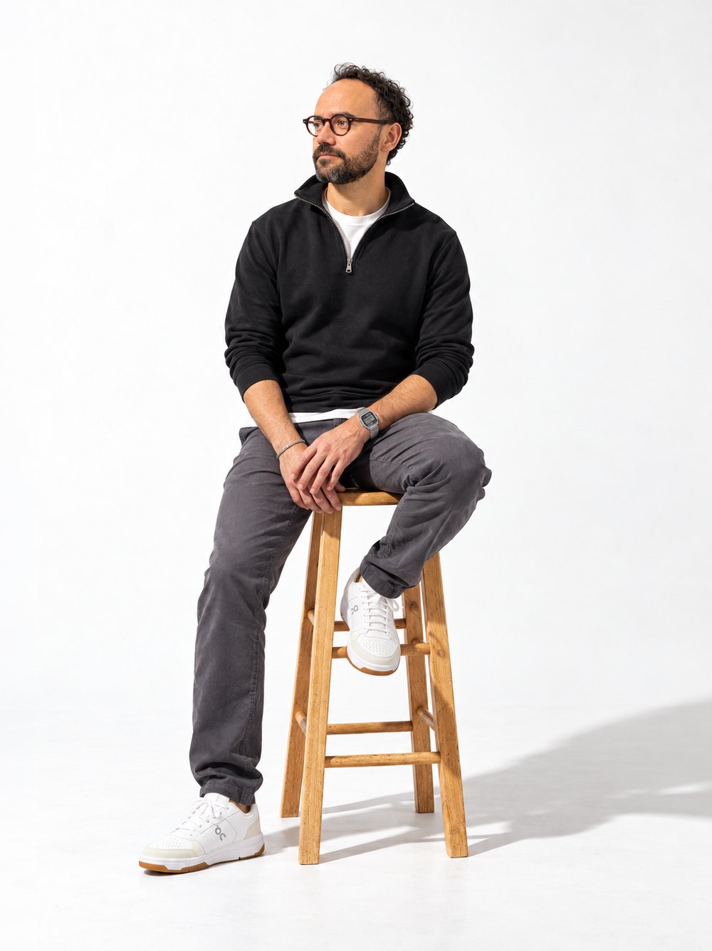 César Gutierrez sitting on a wooden stool